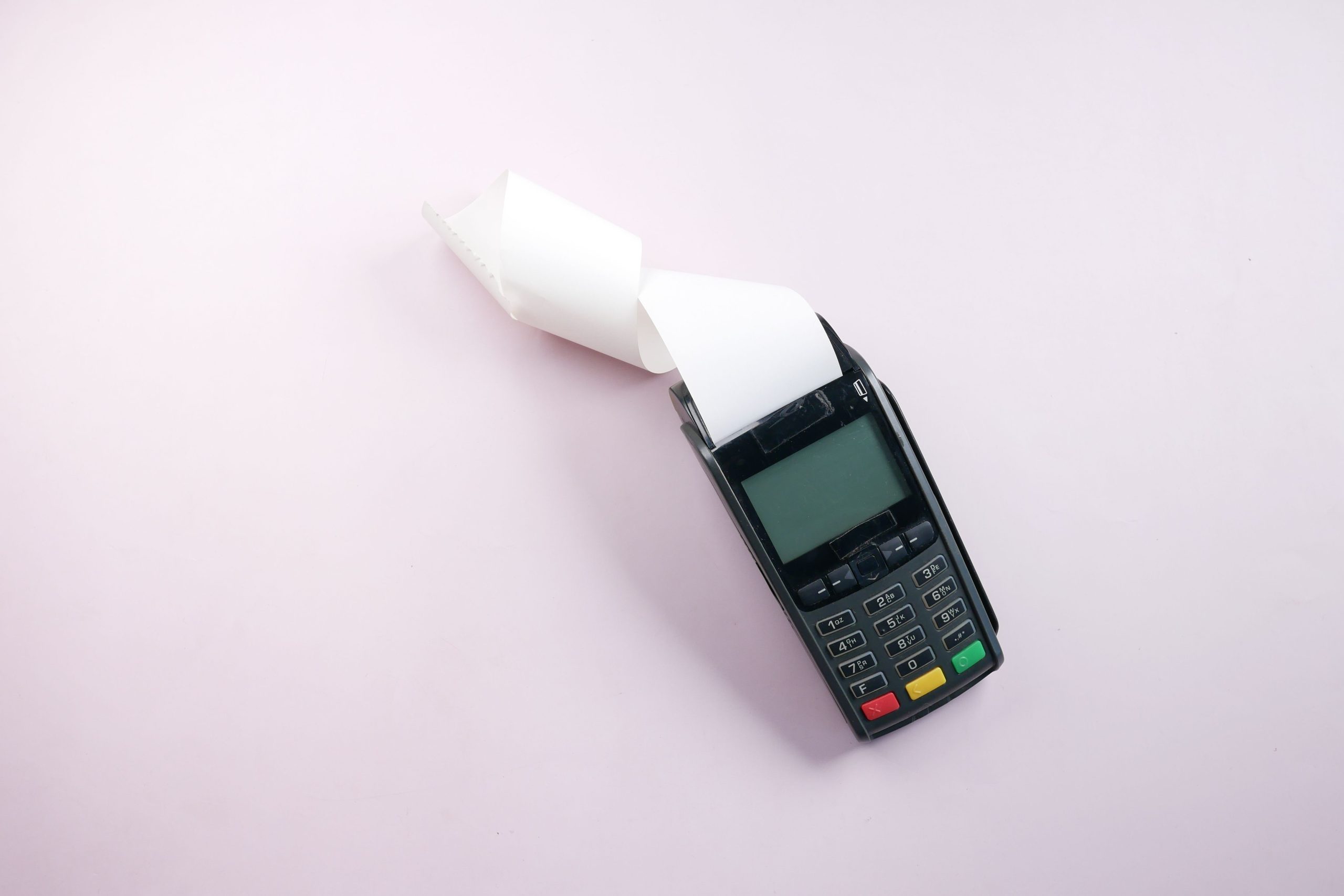 Payment terminal and printed receipt representing an everyday in-store purchase